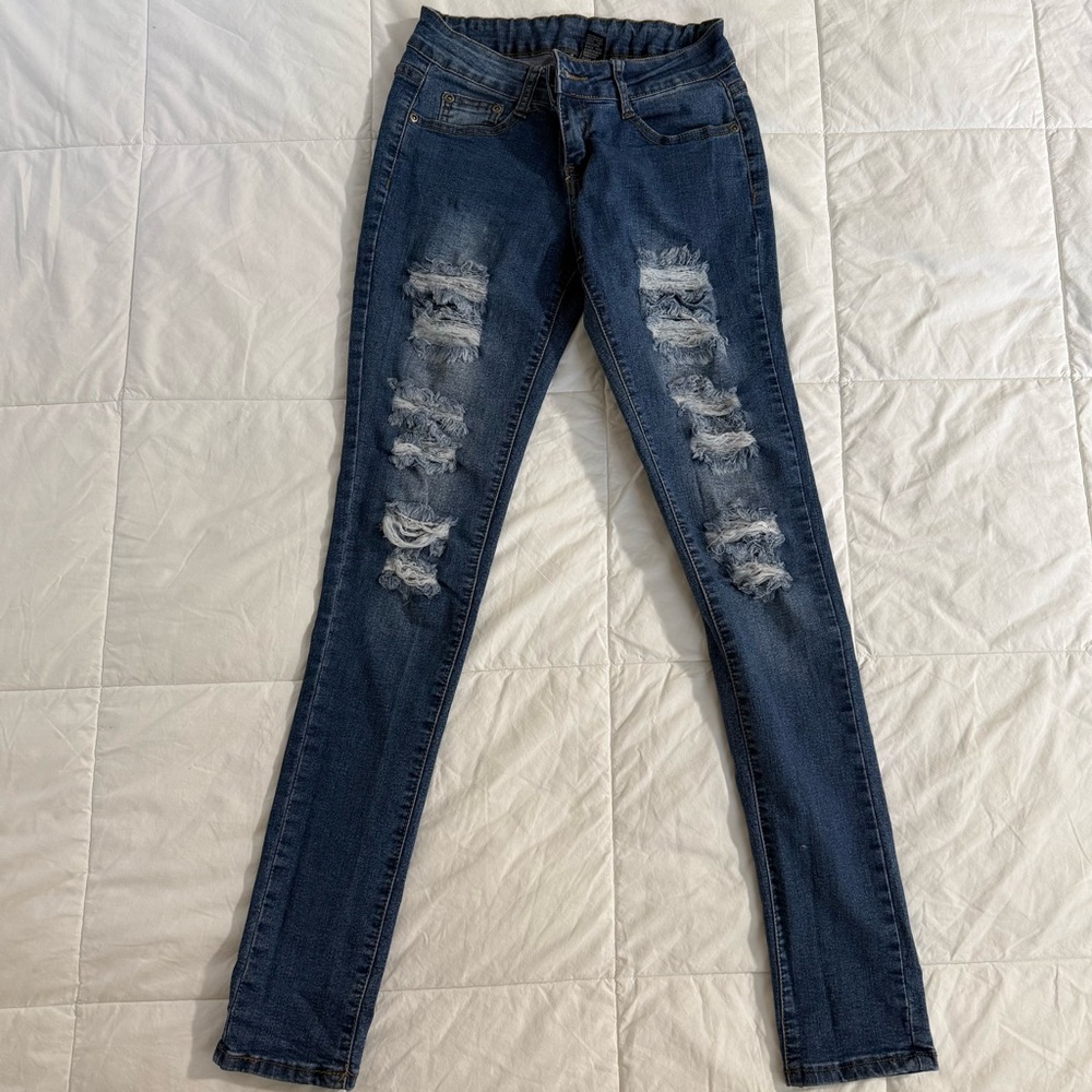Skinny Jeans with Distressed Detailing